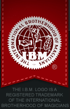 The International Brotherhood of Magicians logo, featuring a magician and globe, with text stating it's a registered trademark.