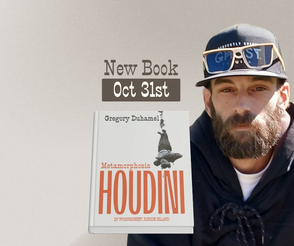 Gregory Duhamel with his book Metamorphosis: Houdini in Woonsocket, Rhode Island.